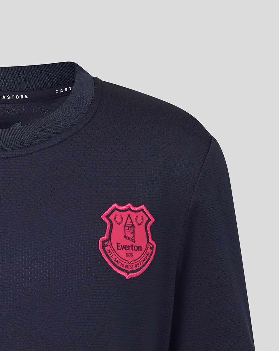 Navy blue t-shirt with a pink crest logo on a light gray background