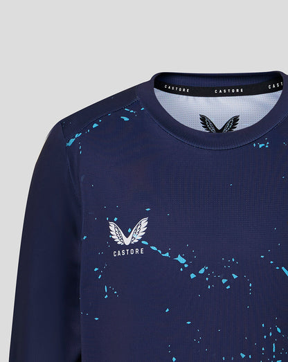 Navy blue sweatshirt with blue splatter pattern and Castore logo on a light gray background