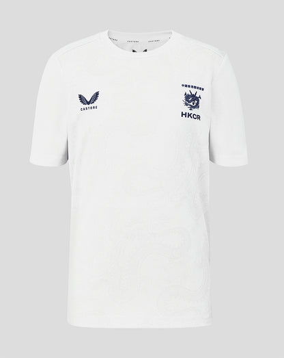 White t-shirt with embroidered logos on a gray background