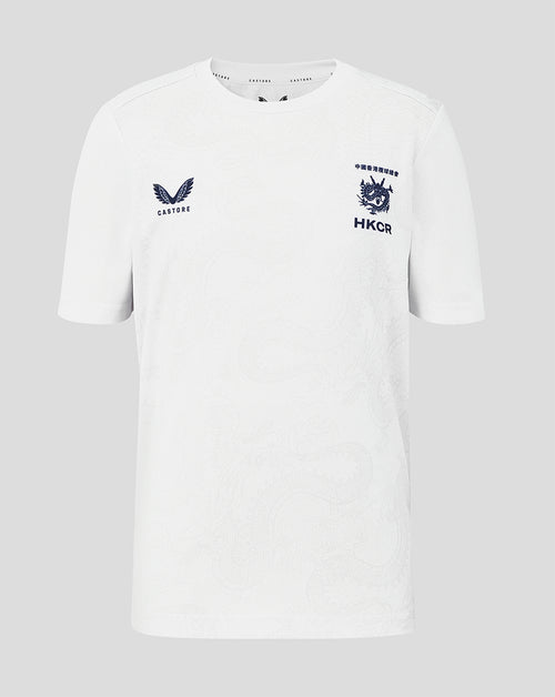 White t-shirt with embroidered logos on a gray background