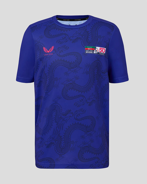 Blue sports jersey with dragon design and branding on a gray background