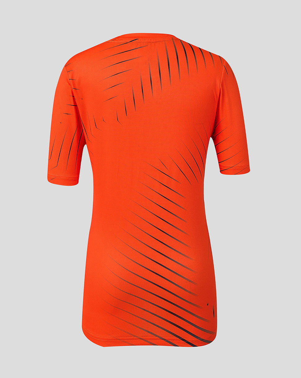 Back view of bright orange juniors Sunrisers Leeds training T shirt with diagonal black stripes