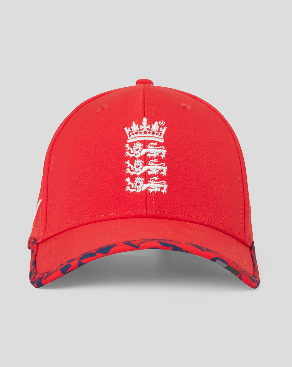 Junior England 24/25 T20 cap in fiery red with England crest on front and printed piping along crown