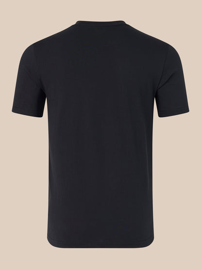 Black t-shirt on a beige background
