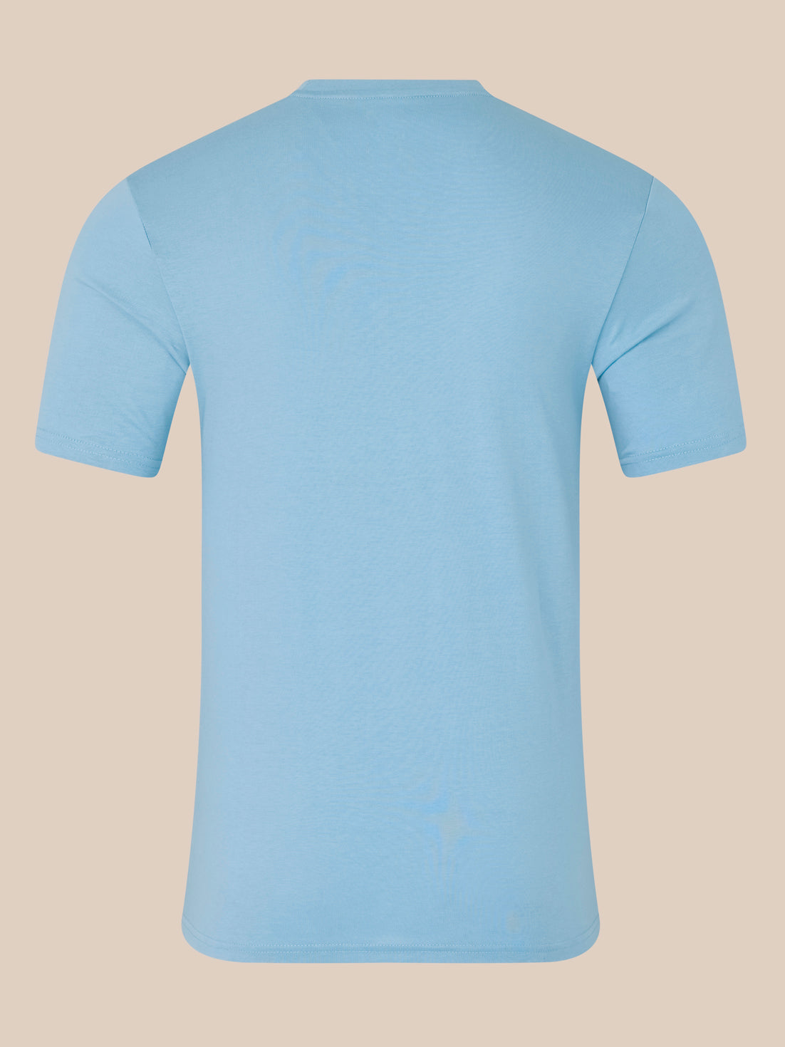 Light blue t-shirt on a beige background