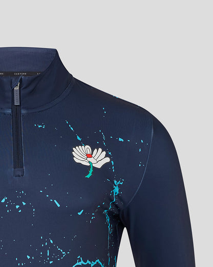 Navy long-sleeve shirt with a logo on a light gray background