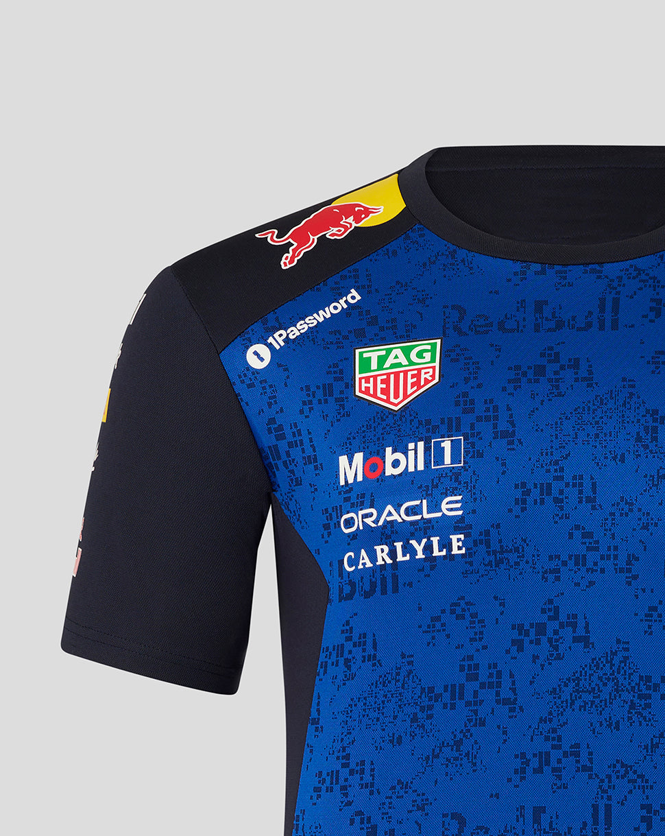 Blue and black sports jersey with various brand logos on a gray background