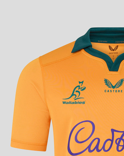 Orange sports jersey with green collar and visible branding on a gray background