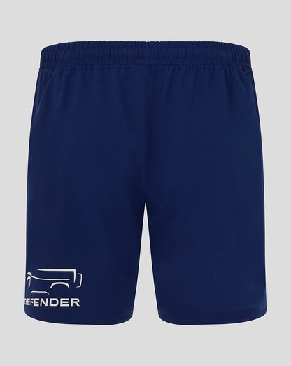 Navy blue shorts with a brand logo on a light gray background