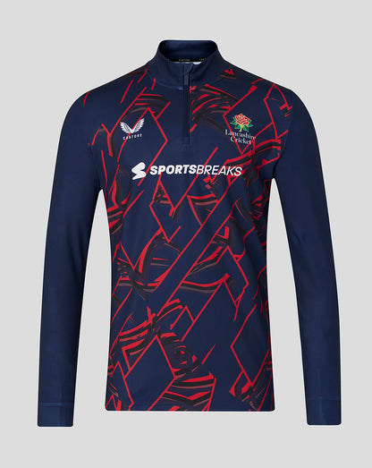 Navy sports shirt with red patterns and visible branding on a gray background