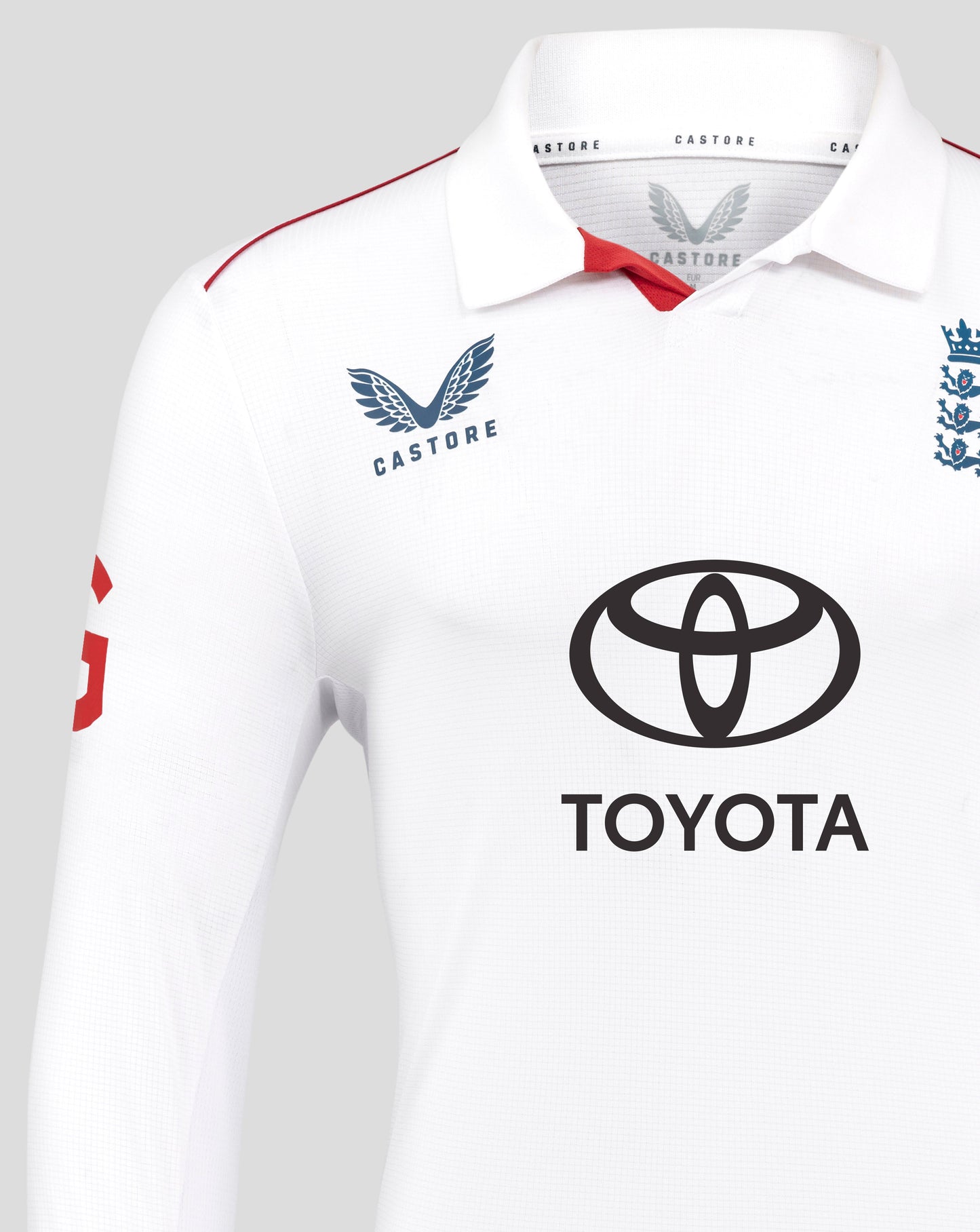 White sports jersey with Toyota and Castore logos on a gray background