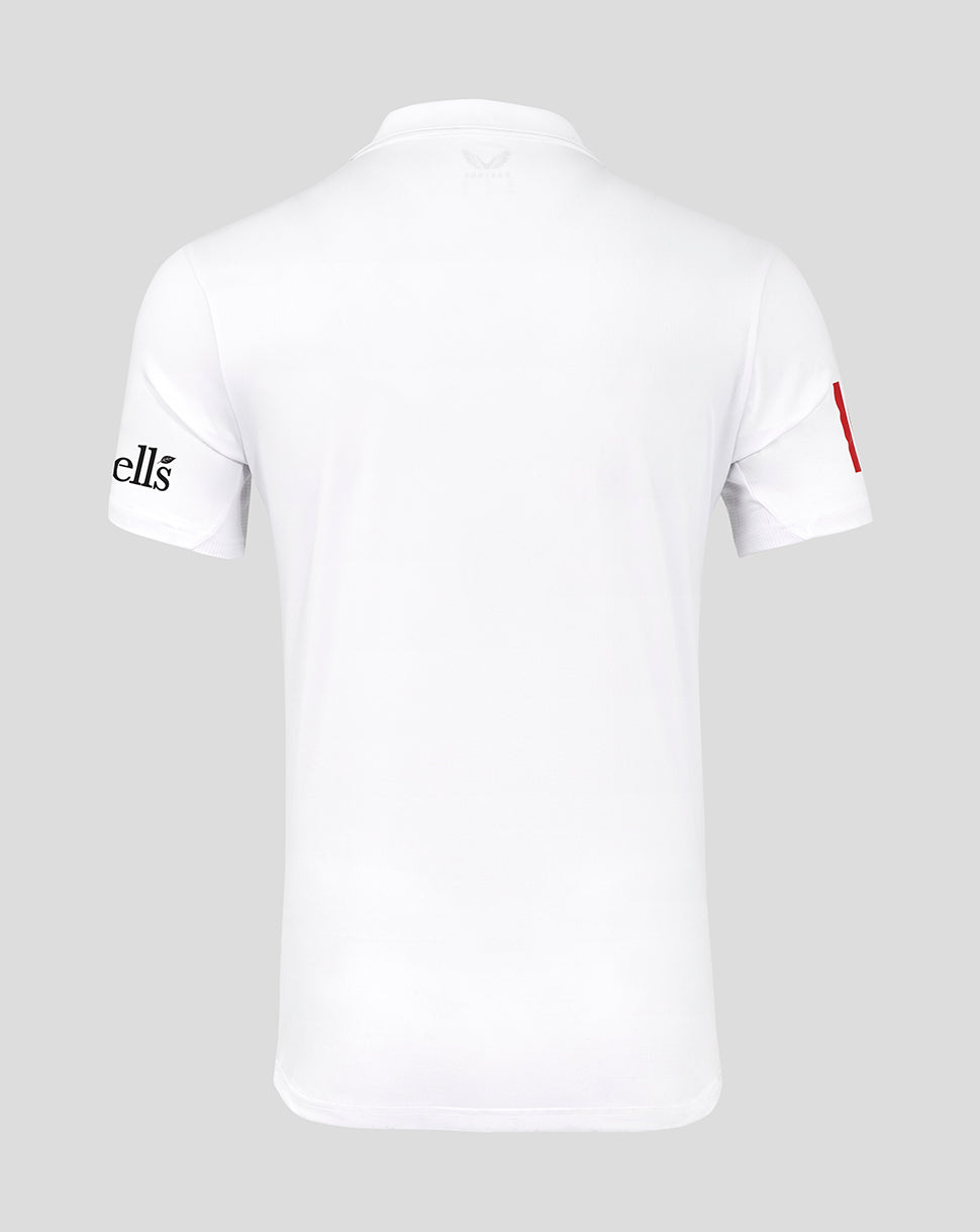 White t-shirt with brand logo on sleeve against a gray background