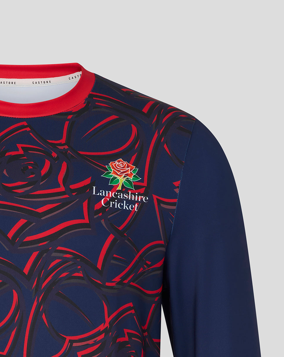 Navy blue sports jersey with red rose pattern and 'Lancashire Cricket' logo on a gray background