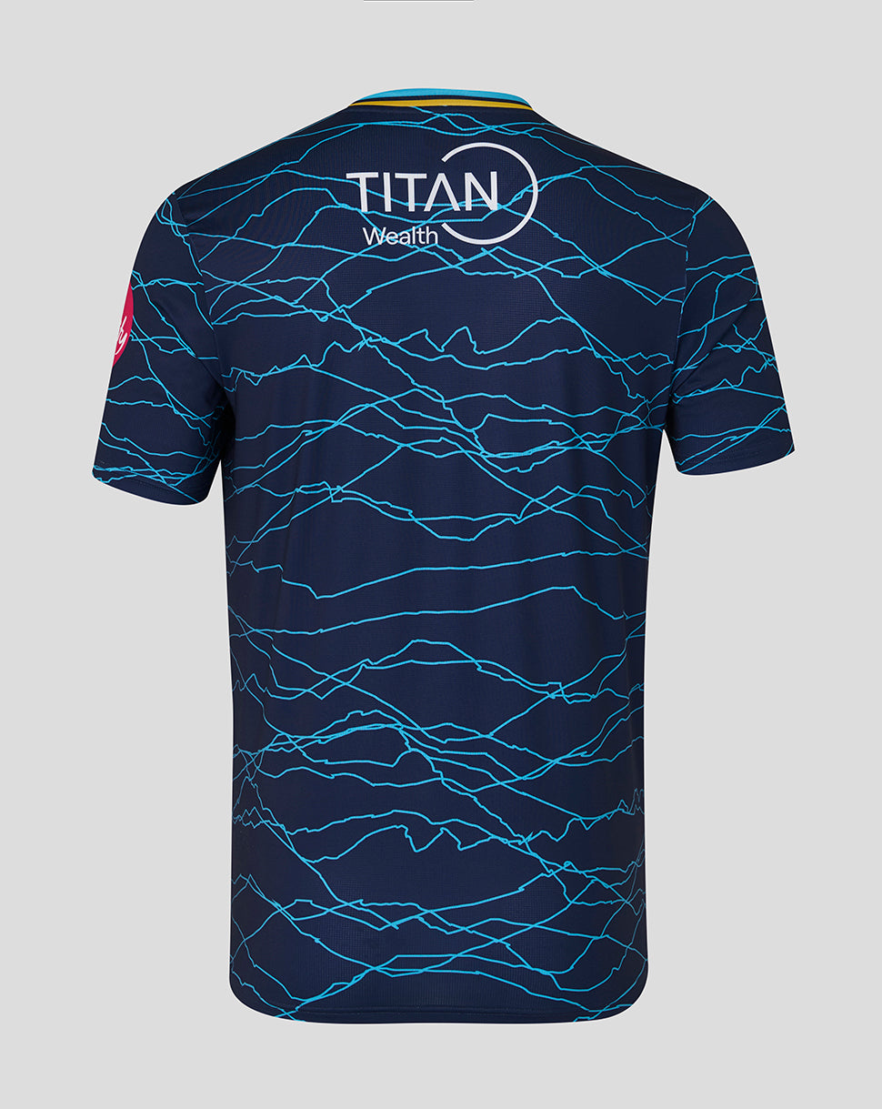 Navy blue sports jersey with blue lightning pattern on a gray background