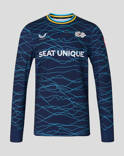 Navy blue long-sleeve shirt with white text and wave pattern on a gray background