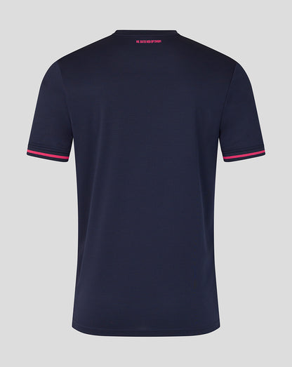 Navy blue t-shirt with pink accents on a gray background