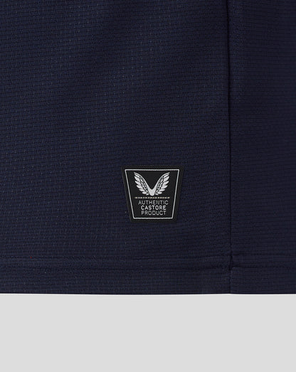 Navy blue fabric with a logo patch on a white background