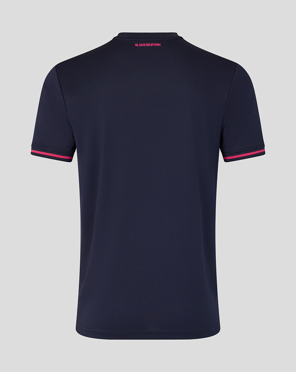 Navy blue polo shirt with pink accents on a light gray background