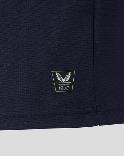 Navy blue fabric with a logo patch on a white background