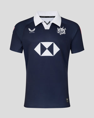 Navy blue sports jersey with white logo and collar on a light gray background