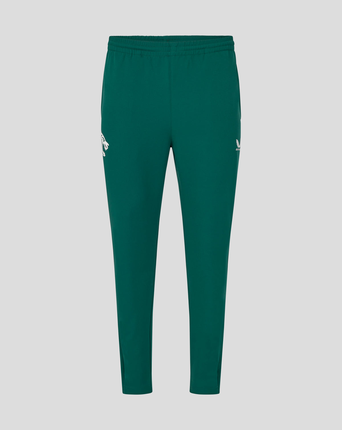 Back view of green Botanical training track pants with a white tiger logo on the left leg
