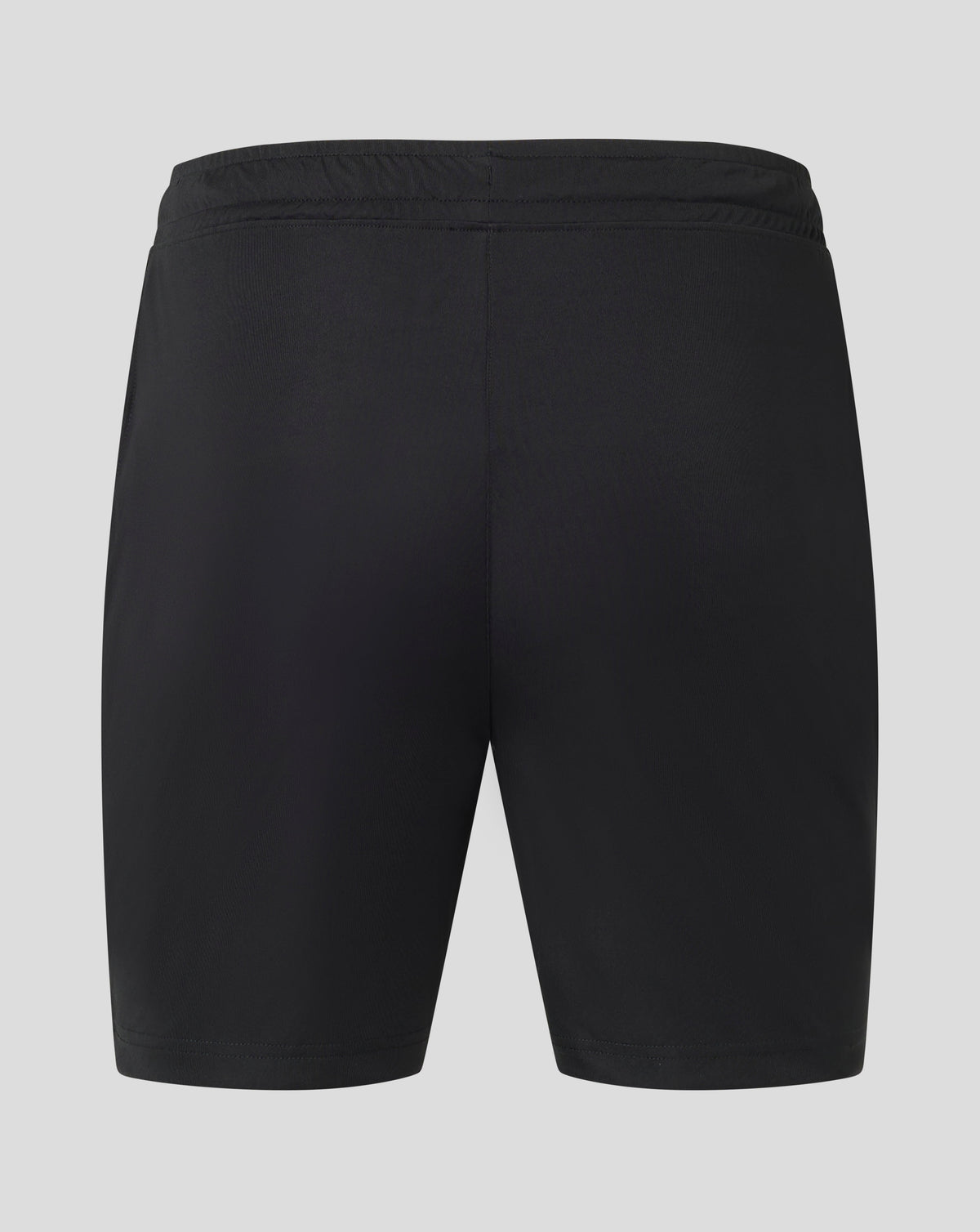 Back view of black Mens Match Short showing elastic waistband and small white Castore logo at the hem