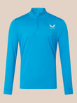 Blue long-sleeve shirt with a brand logo on a beige background