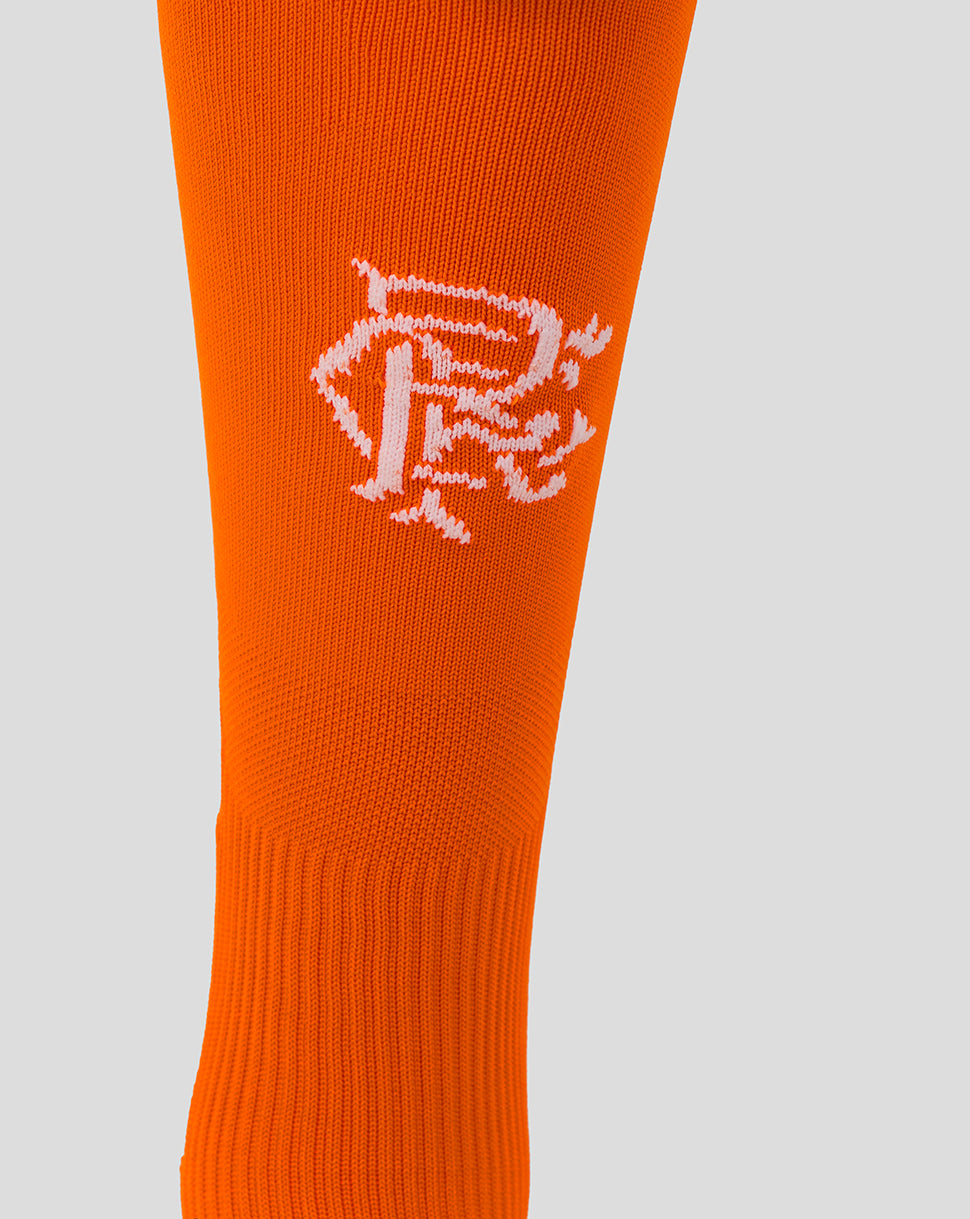 Close-up of the orange Rangers sock showing a white Umbro logo on the shin.
