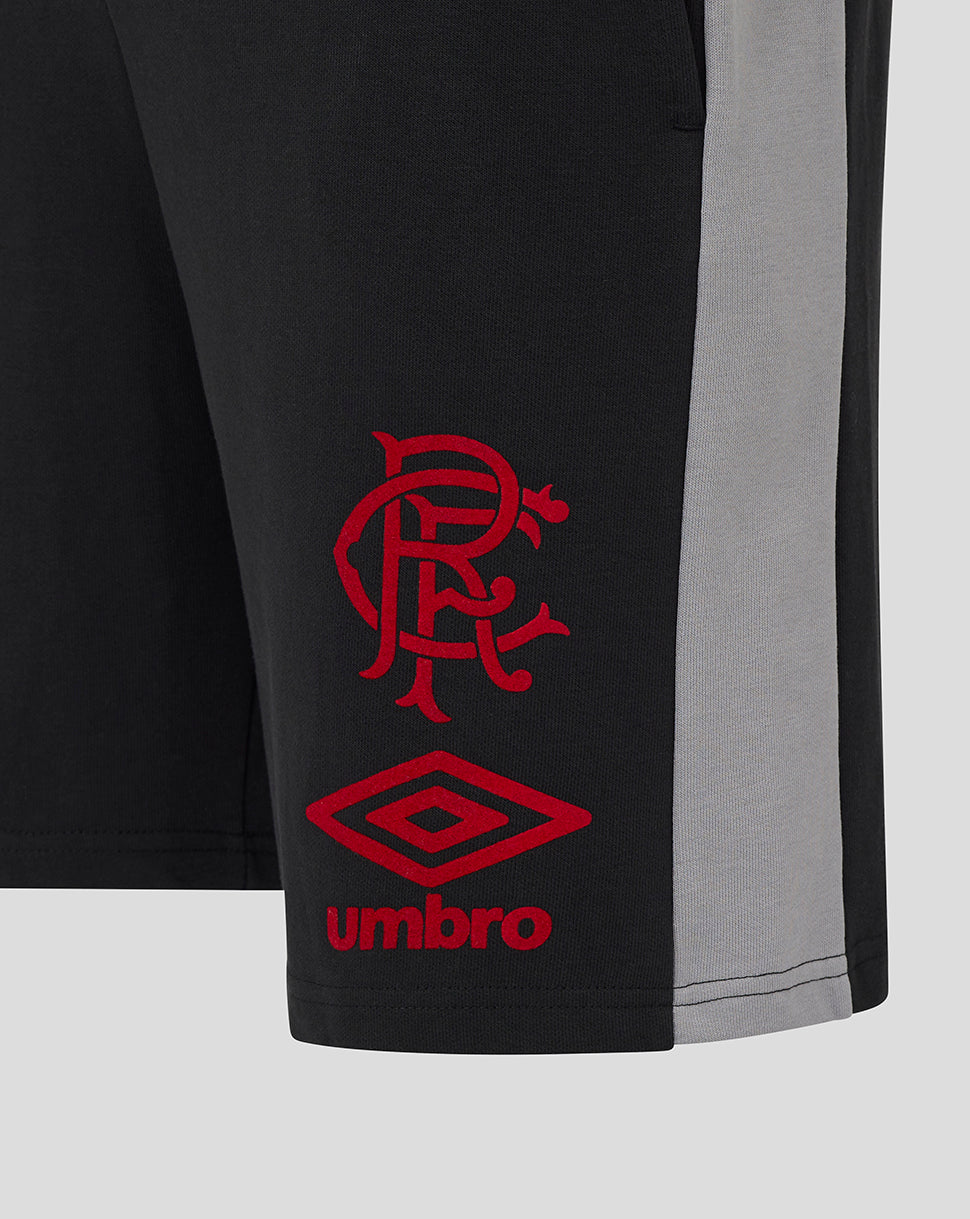 Close up of Rangers Travel Shorts in black with a red Umbro logo on the leg and a grey side panel.