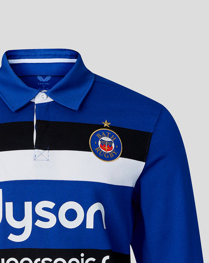 Blue rugby jersey with a logo and 'Dyson' branding on a gray background