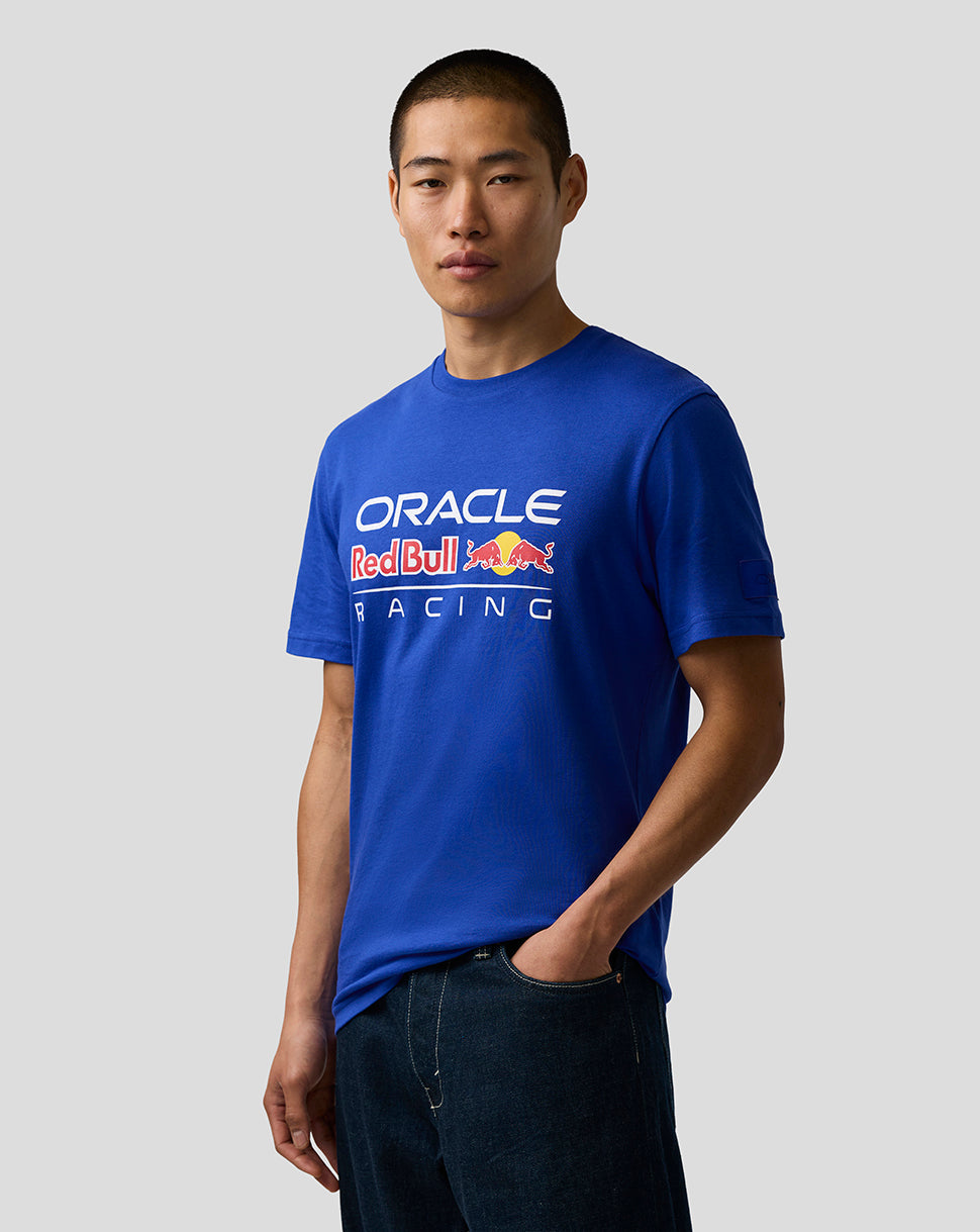 Person wearing a blue 'Oracle Red Bull Racing' t-shirt on a plain background