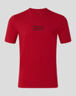 Red t-shirt with a logo on a gray background
