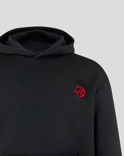 Black hoodie with a red logo on a light gray background