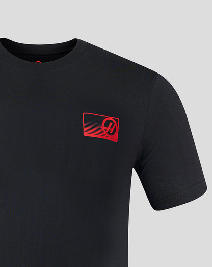 Black t-shirt with a red logo on a gray background