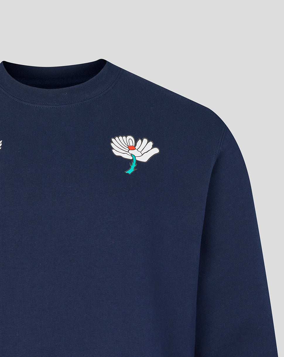 Navy blue sweatshirt with a colorful embroidered design on a light gray background