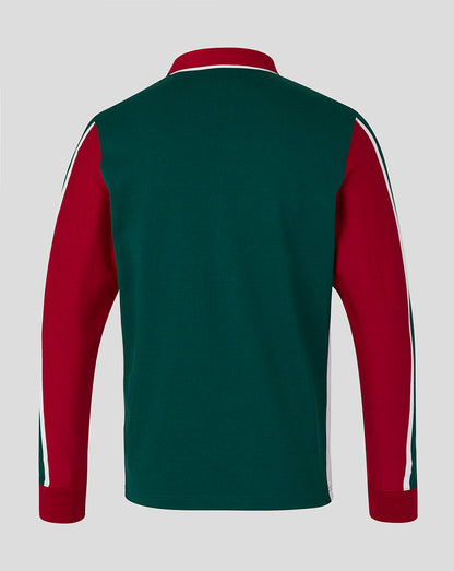 Green and red sports top with white stripes on a gray background