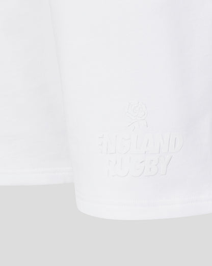 White t-shirt with text on a light gray background