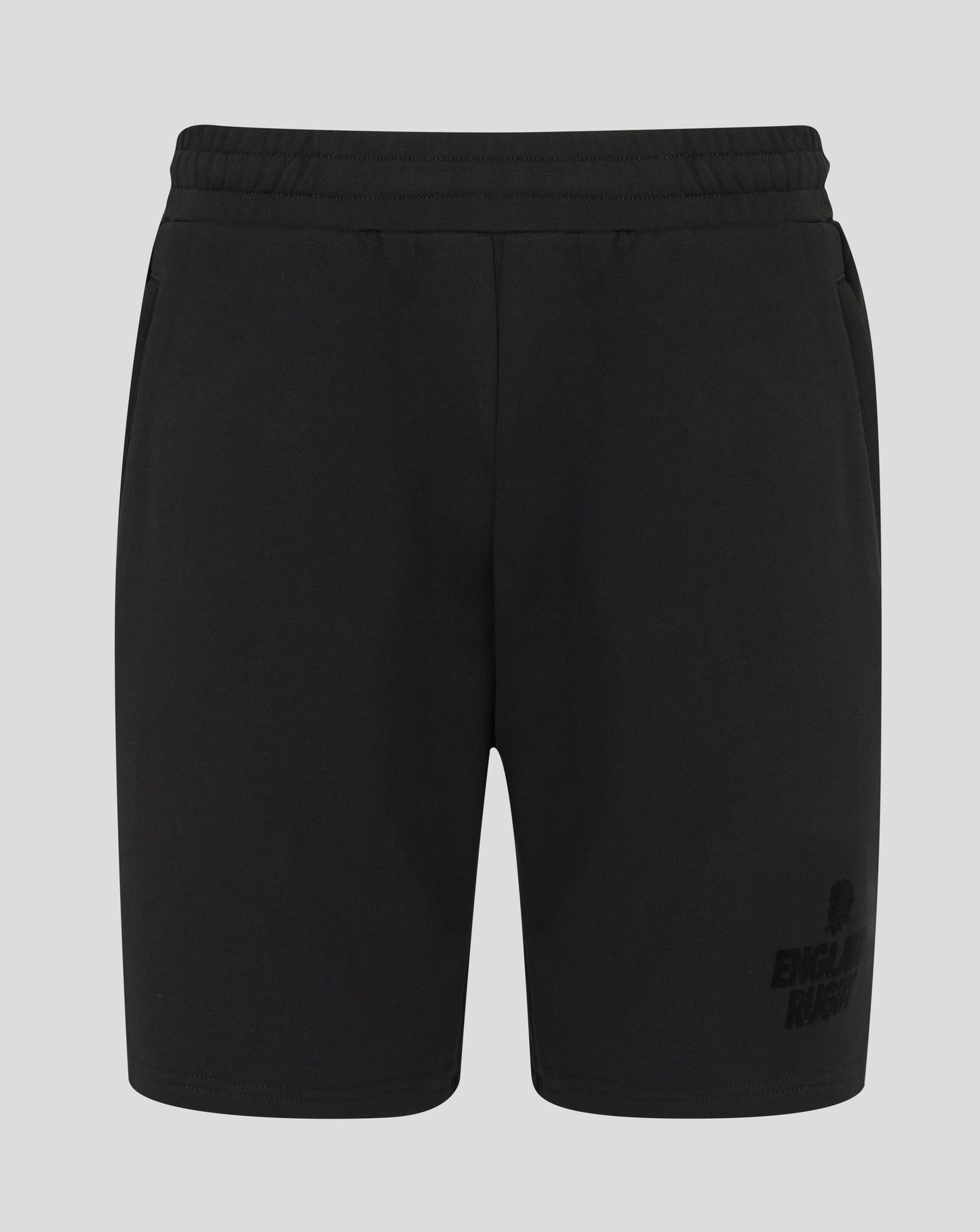 Black shorts with a brand logo on a light gray background