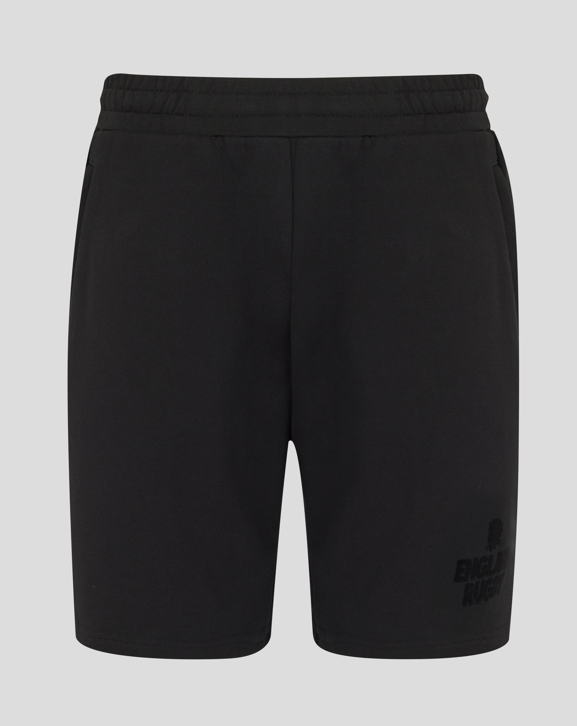 Black shorts with a brand logo on a light gray background