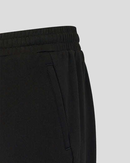Black pants on a light gray background