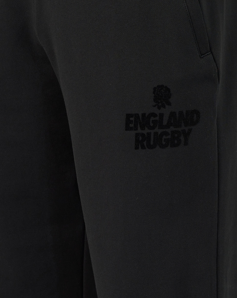 Black pants with 'England Rugby' logo on a dark background