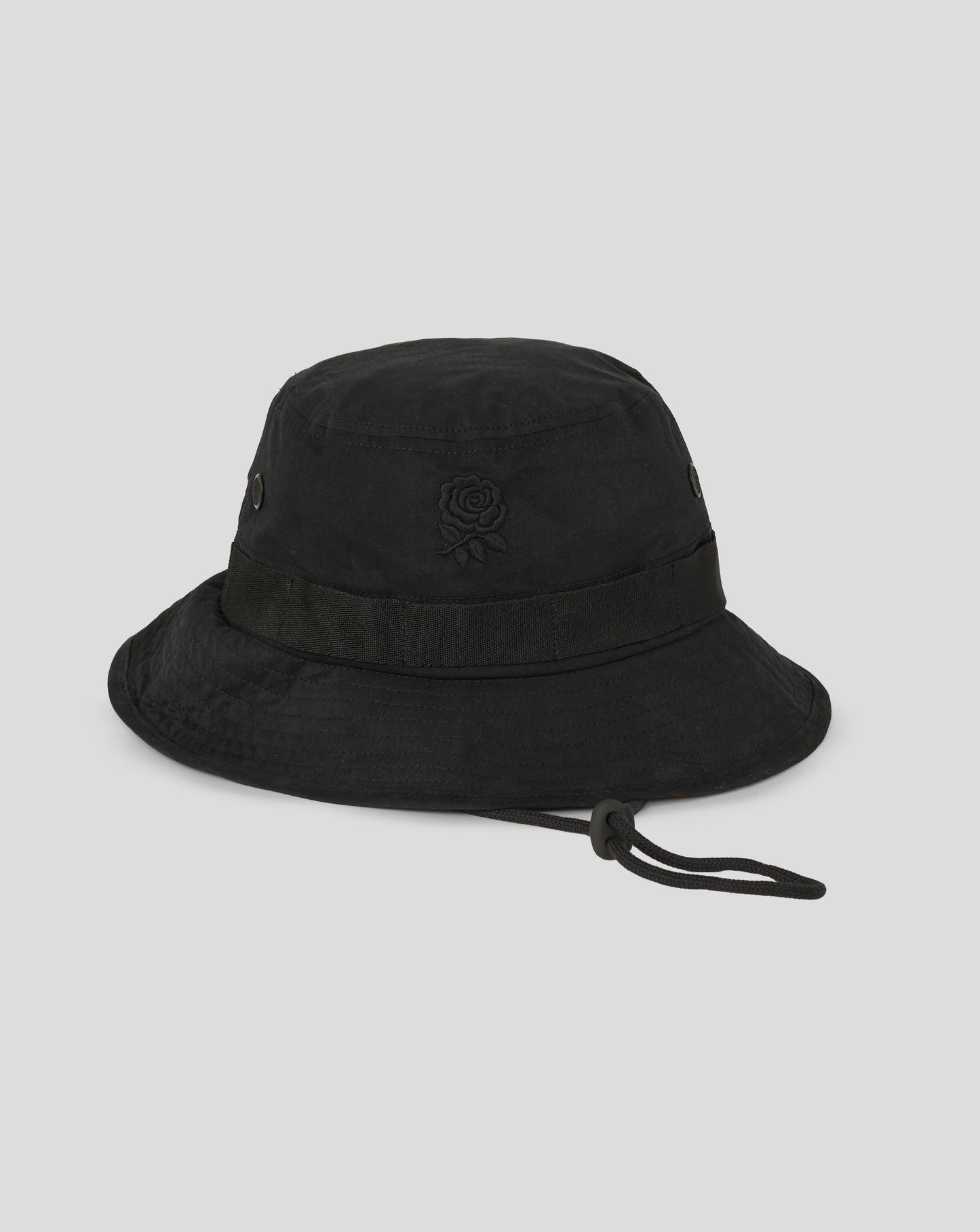 Black bucket hat with a brand logo on a light gray background
