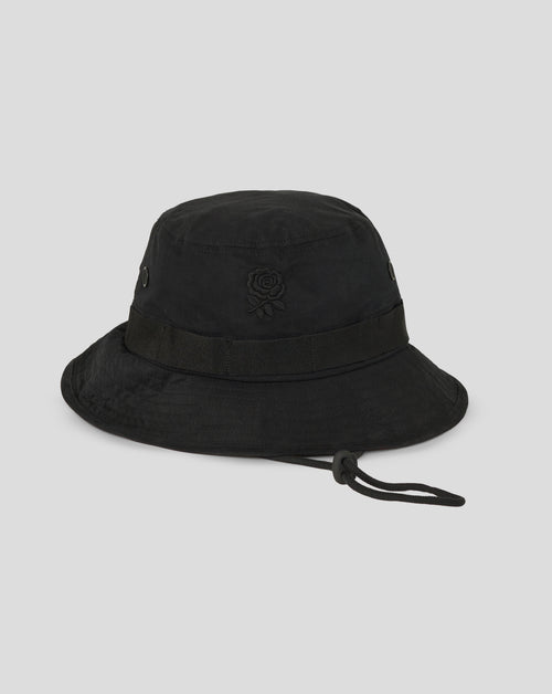 Black bucket hat with a brand logo on a light gray background
