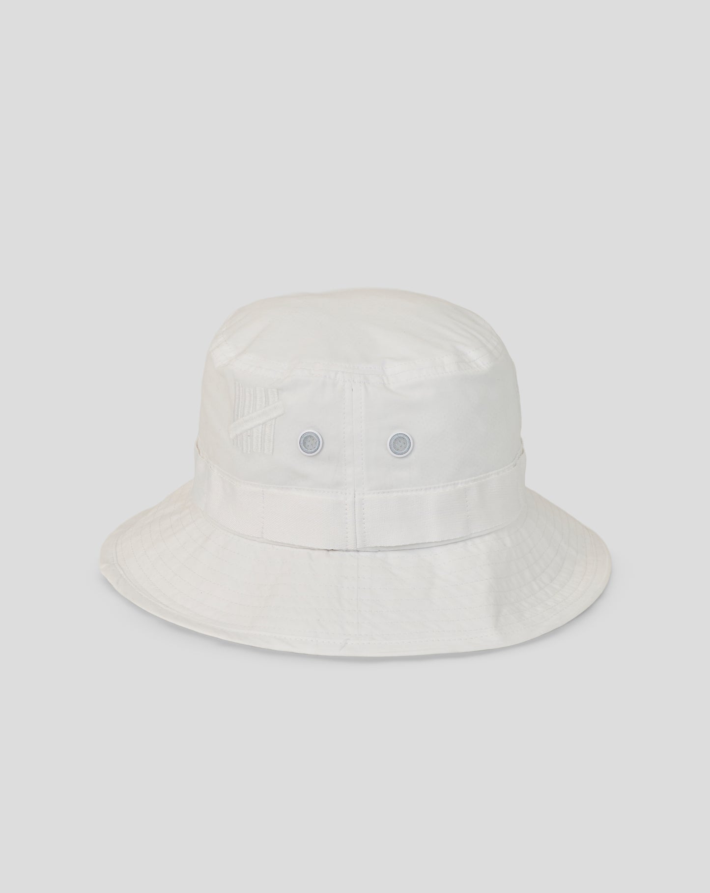 White bucket hat on a light gray background