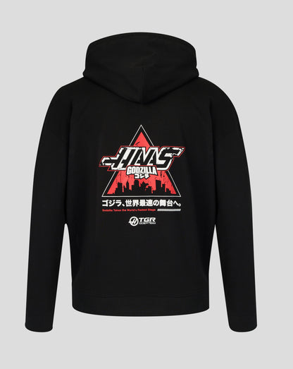 Black hoodie with a graphic design on the back against a gray background