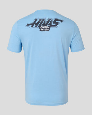 A light blue short-sleeve t-shirt shown from the back, featuring a large black and white graphic print on the upper back with the text 'HAAS' and 'GODZILLA MINUS ZERO'.